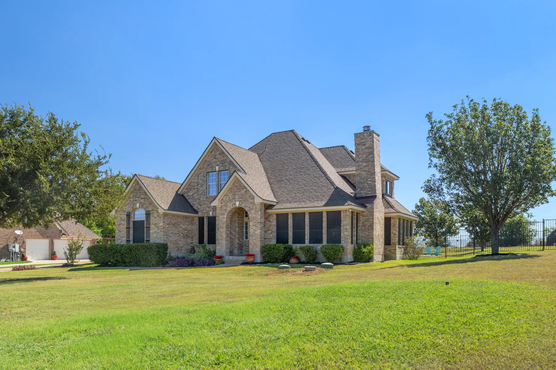 Front elevation viewed across the lawn