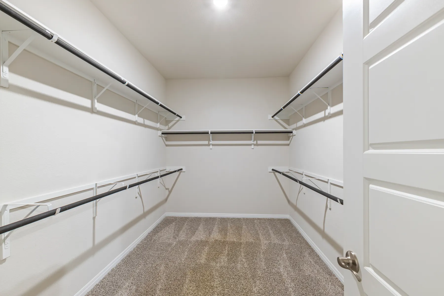 Walk-in closet with built-in shelving